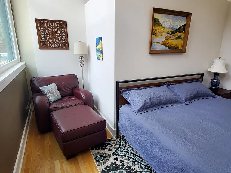 Reading nook with over-sized chair included in Bedroom