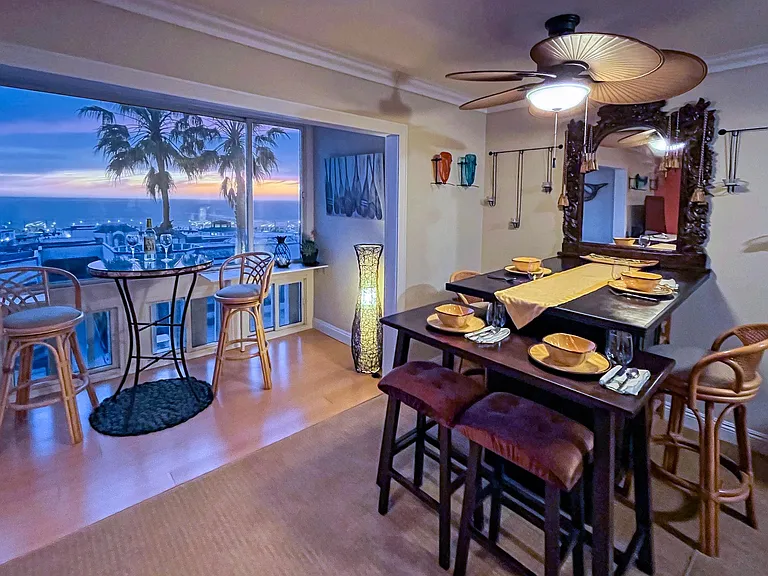The solarium features sliding windows that allow the room and its views to be enjoyed even on windy days.