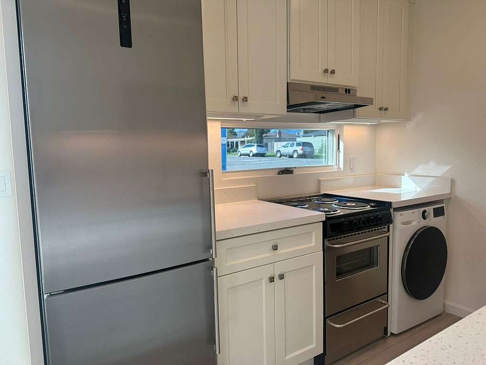 Refrigerator, freezer, electric stove and over, electric dryer.