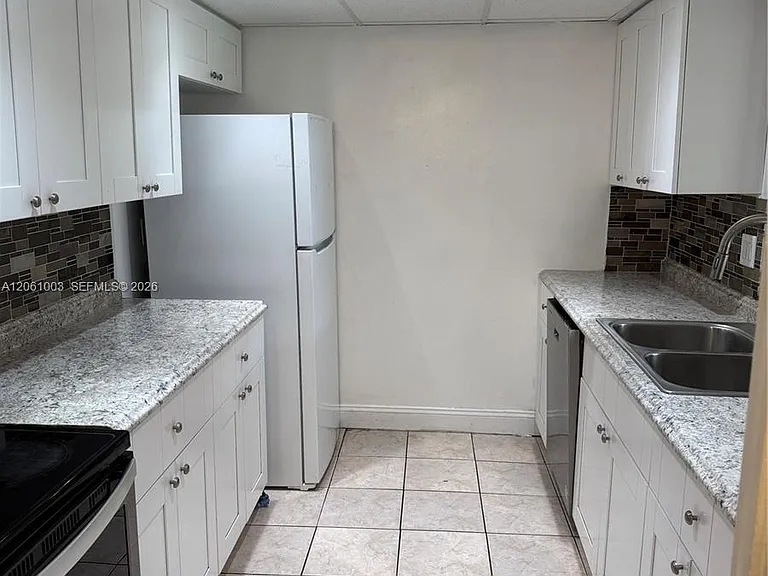 3246 N Pine Island Rd #101 — Photo 26