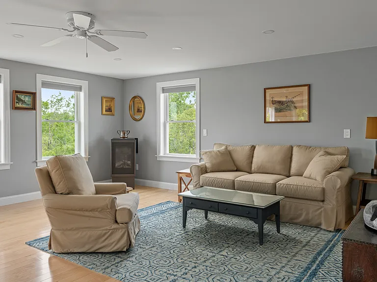 the living room with the gas fireplace