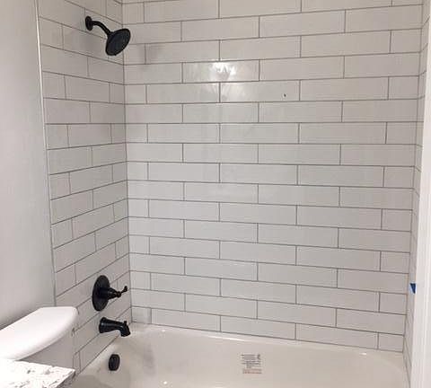 Main Bath w Subway Tile to ceiling and granite countertops