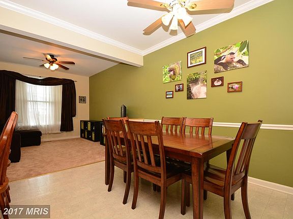 Large dining room with adjoining family room