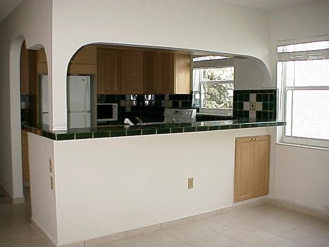 Breakfast bar with under counter wine storage.