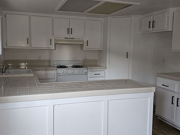 Large Kitchen with lots of Cabinets for your storage