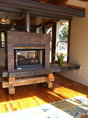 Gas fireplace can be viewed from both living and dining room