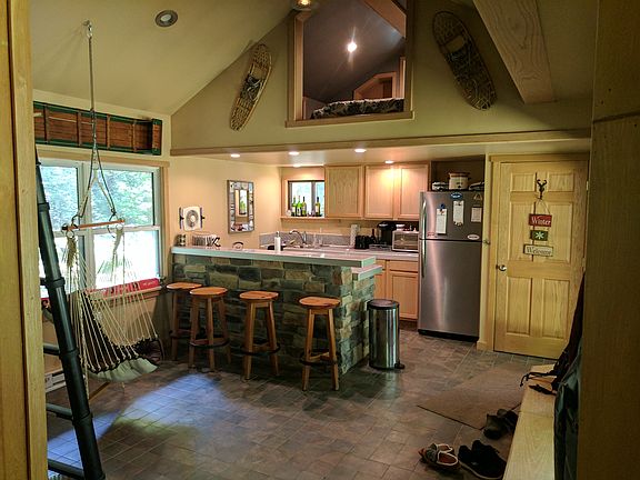 Kitchen with sleeping loft above
