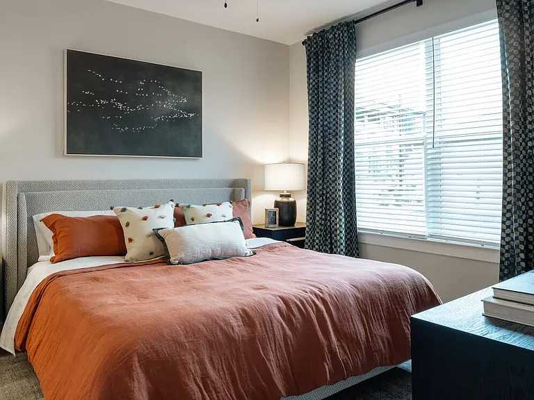 Bedroom with hard-surface vinyl plank flooring