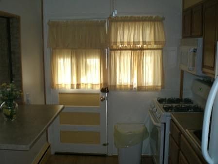 Bar table, freshly painted w/ pergo floors