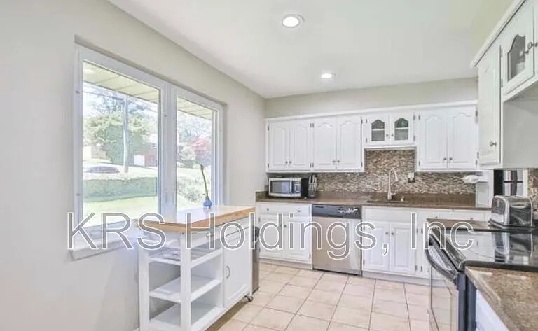 7110 Murray Ln — Photo 2