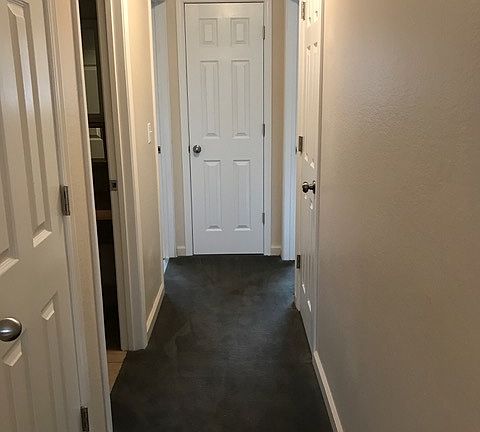 Hall with 3 closets