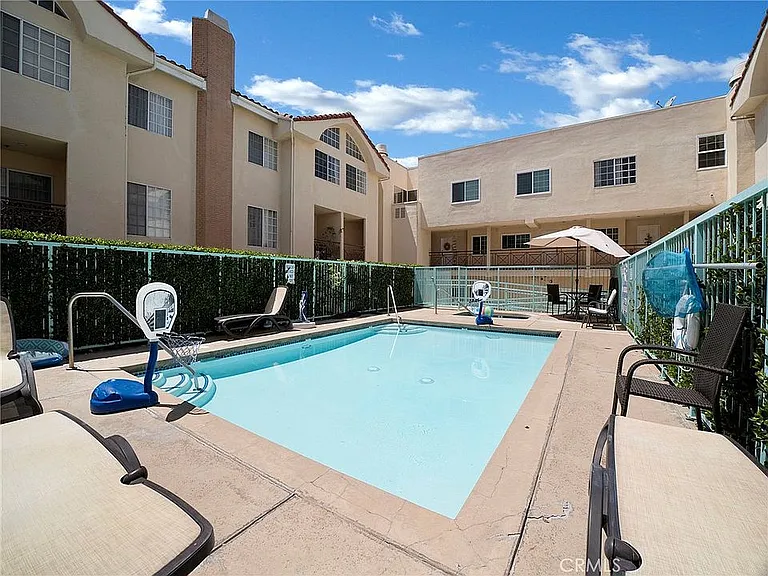 Fenced swimming pool.