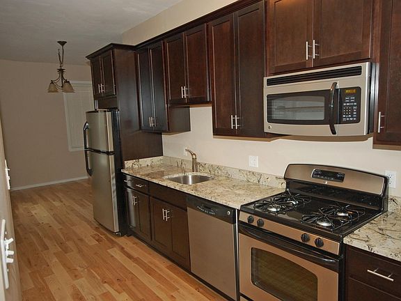 Newly renovated kitchen with granite countertops and stainle