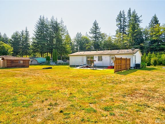 Privacy fence and tool shed. Second RV parking to the right with power. 