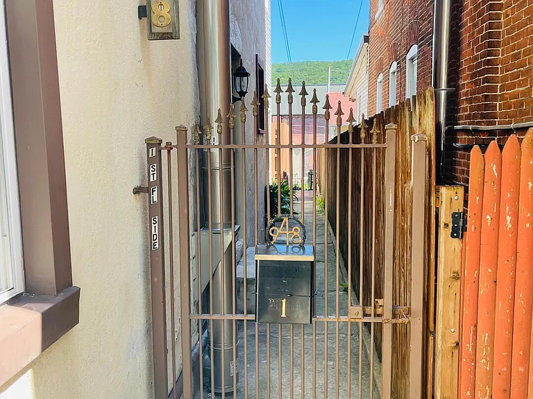 Gated entrance to front door