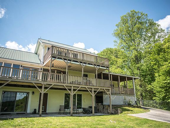 Three levels of a gorgeous view and a great back yard recreational space.