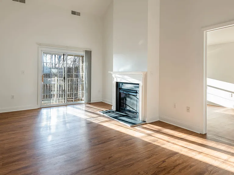 Living Room with Fireplace and Balcony