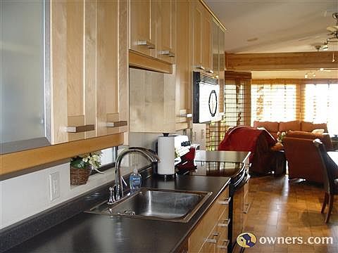 Kitchen looking back into Living Area