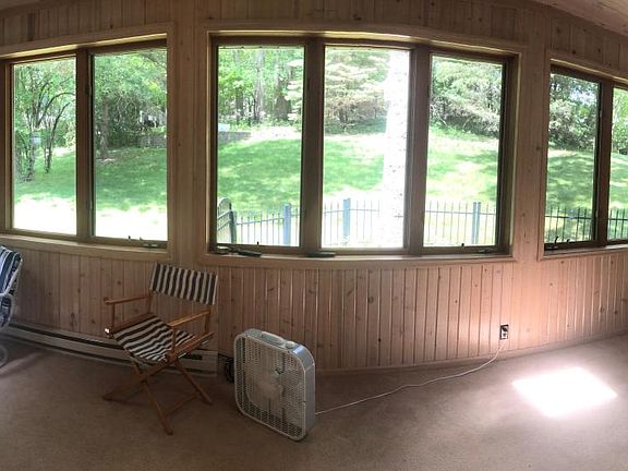 Enjoy the spacious sunroom overlooking your large, private back yard. 2 Natural skylights and screened windows surrounding make this the perfect room to enjoy summer nights.