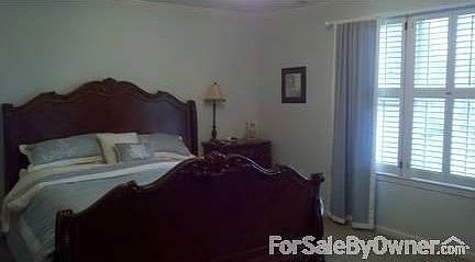 Family Room
						:
						Attractive Family Room open to Eat-in Kitchen. Gas Log Fireplace. Great windows.