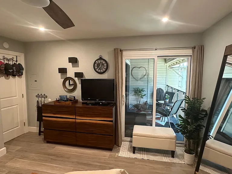bedroom with drapes pulled open