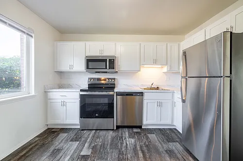 Coach House Apartments Photo 1