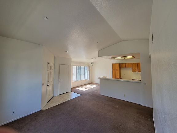 Living room, dining room and kitchen.