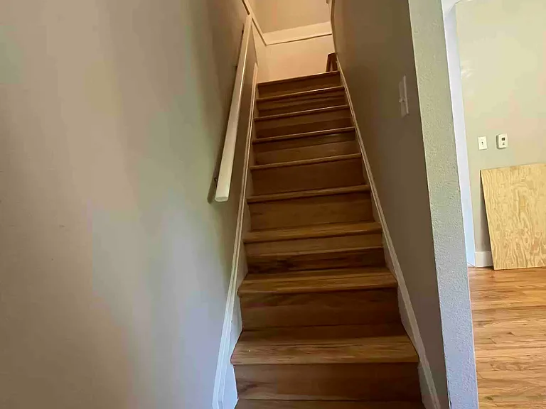 Narrow stairs to 2 bedrooms