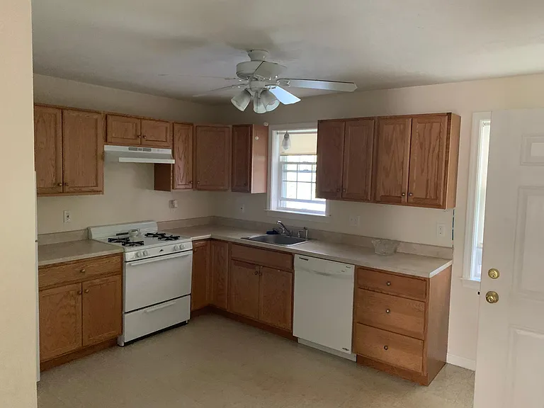 Large eat in kitchen with covered porch