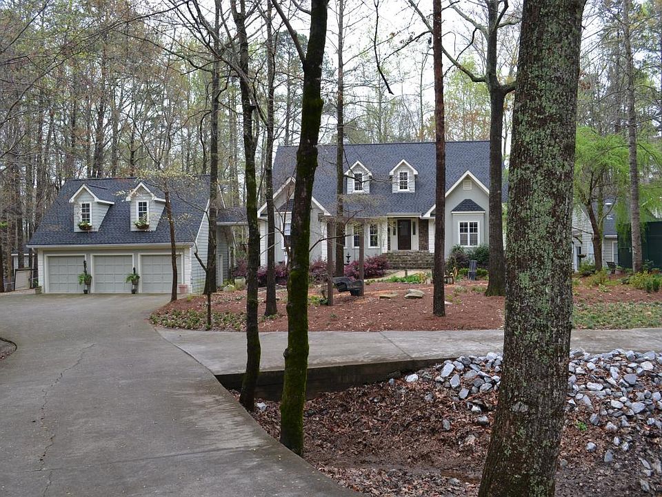 Image of my home and the garage with apt.