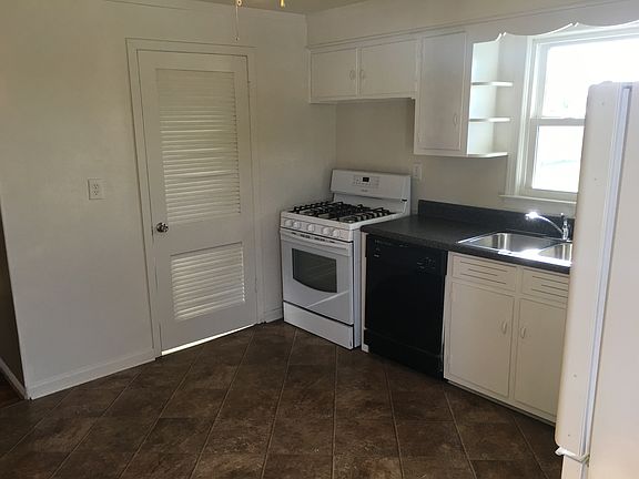Laundry located in separate room off kitchen