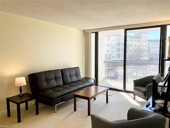 Living Room opens to balcony and storage