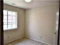VIEW OF BEDROOM #2 WITH NEIGHBOR VIEW.