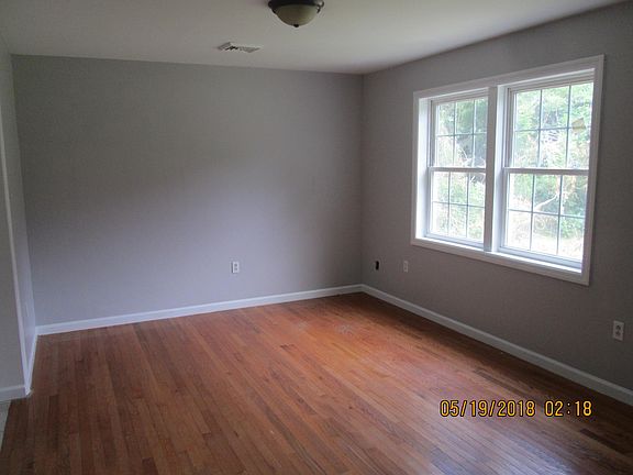 Living room with double front windows  
