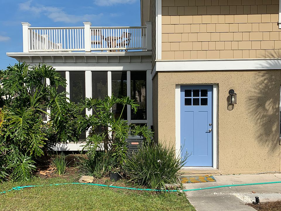 Front of Unit A, including screen porch and deck
