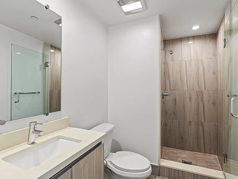 Bathroom with Stand-Up Shower with Glass Door