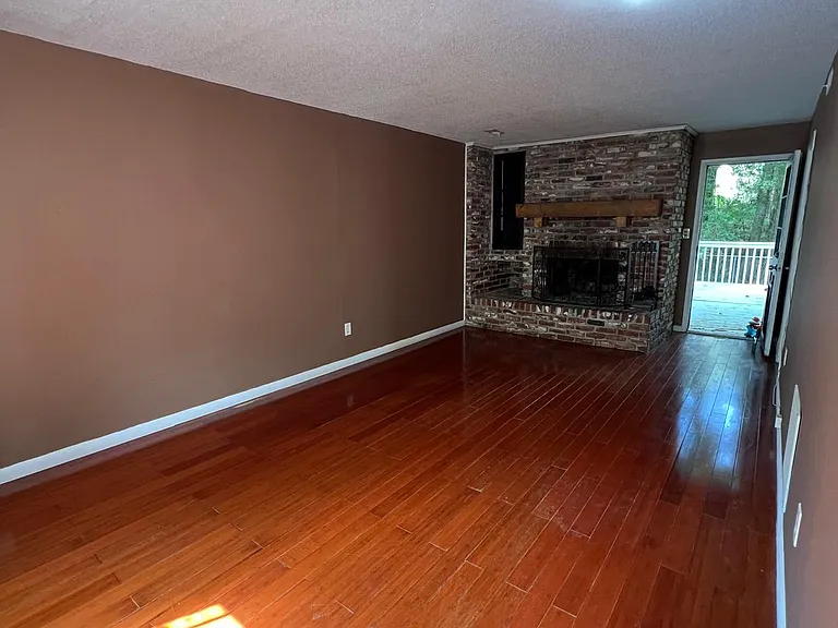 Family room leading to large deck in the back for quiet enjoyment of evening and BBQ