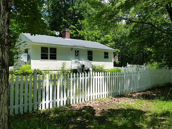 Surrounded by a picket fence
