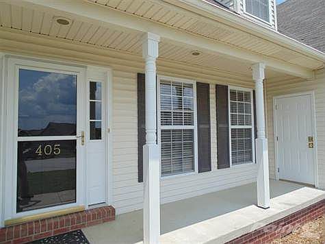 NOTE THE MAN DOOR COMING FROM THE GARAGE.  EVER LIVE IN A HOME THAT DOESN'T HAVE A MAN DOOR FROM THE GARAGE?  IF SO, YOU WILL APPRECIATE THE CONVENIENCE OF HAVING ONE WITHOUT HAVING TO USE THE OVERHEAD DOOR EVERY TIME YOU COME AND GO.