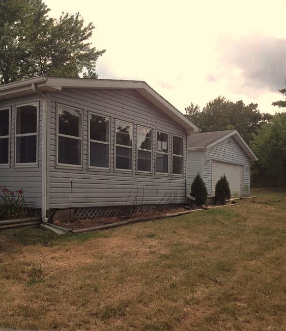 2403 W County Road 100 S.