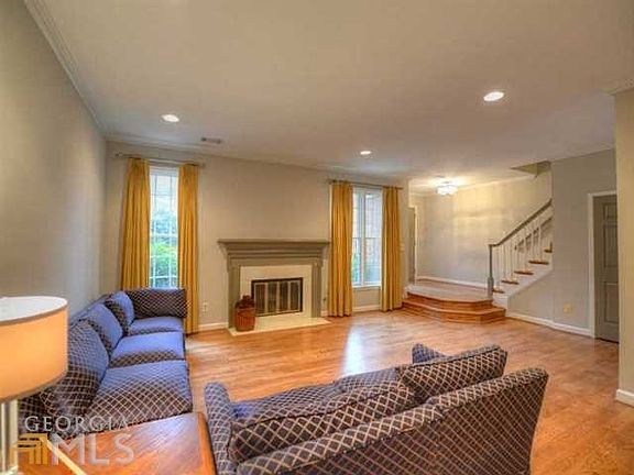 Large 19 x 14 (approx) foot front living area. New hardwood floors, new recessed lighting, architectural trim. Light, bright, perfect for entertaining.
