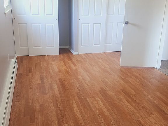 Large main bedroom with connection to bathroom and double closets