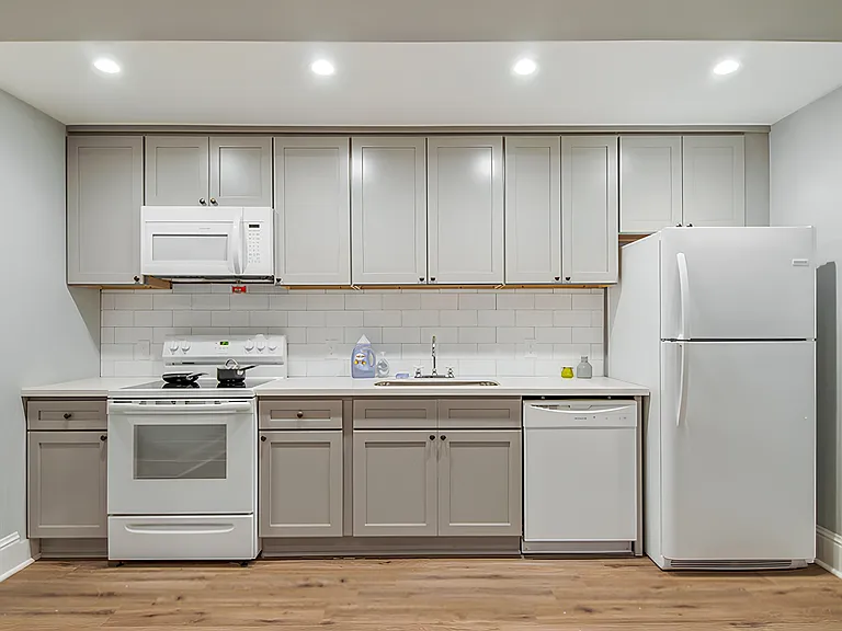Beautiful kitchen with all new appliances and stocked with basic equipment.