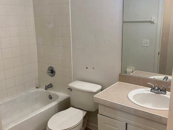 Full bathroom with tub