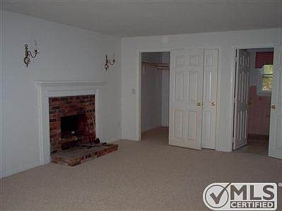 Master bedroom suite with walkin closet and full bath and fireplace