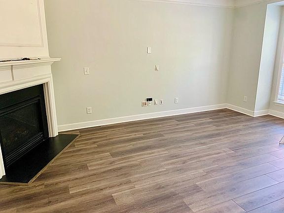 Spacious living room are with gas fireplace