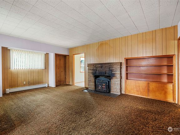 View of living room from the front door.>