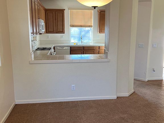 Dining area looking into kitchen