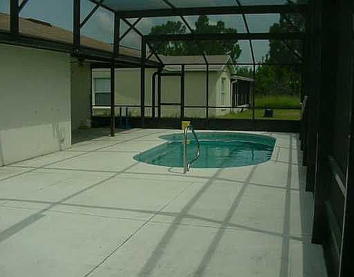 Pool with oversized screen enclosure!