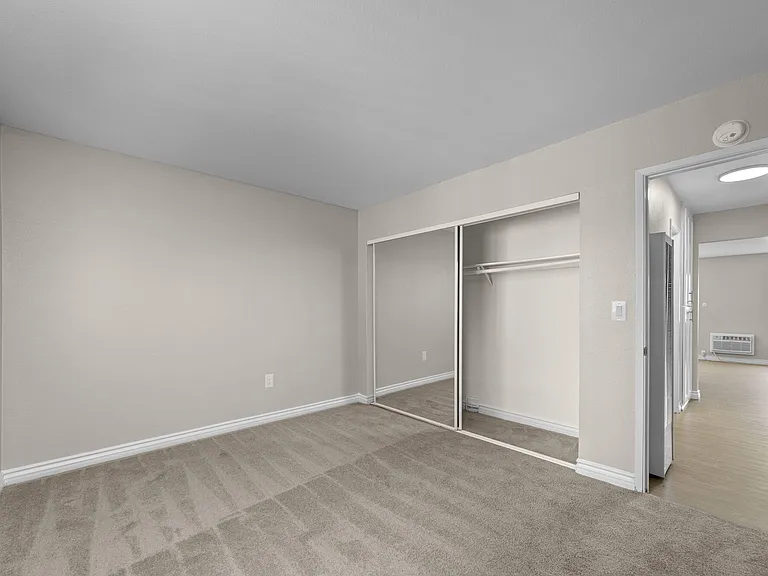 Apartment bedroom and large closet at Strada Apartments in Orange, CA